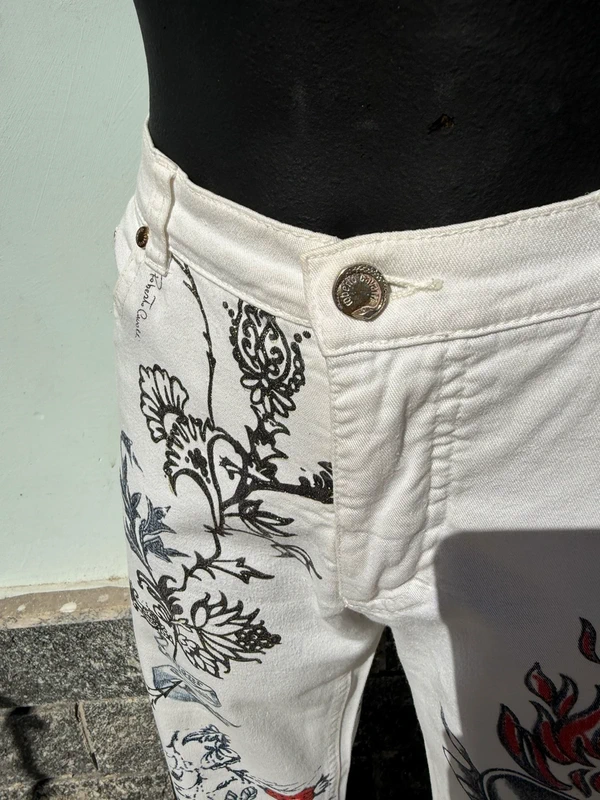 Jeans Roberto Cavalli stampa tatuaggio tigre e rose SS2003