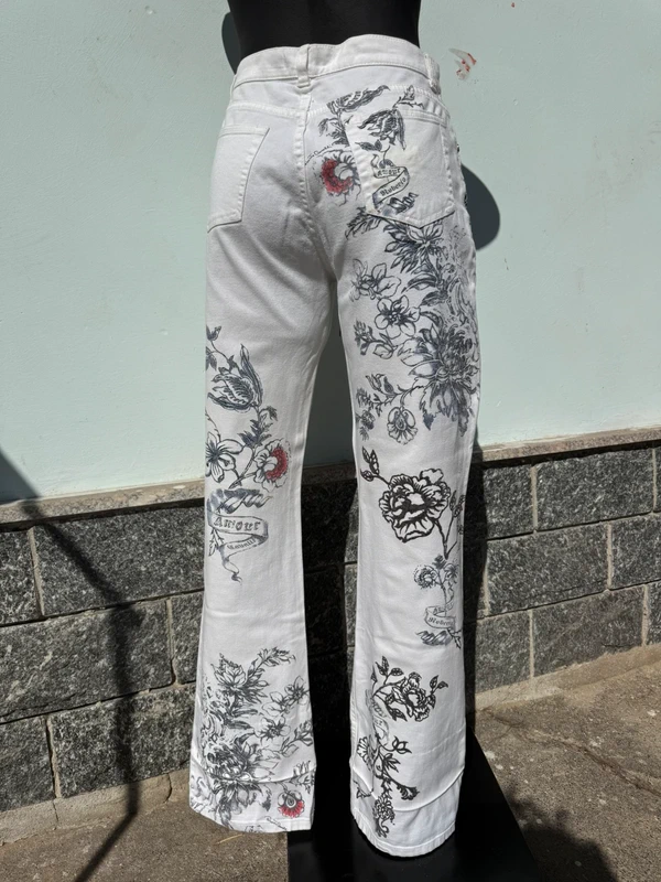 Jeans Roberto Cavalli stampa tatuaggio tigre e rose SS2003