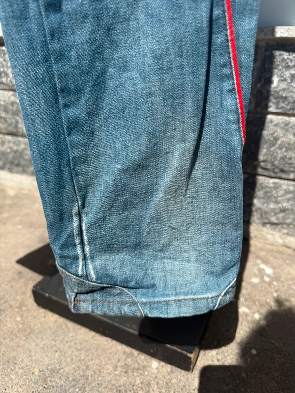 Jeans uomo con inserito CNC Costume National